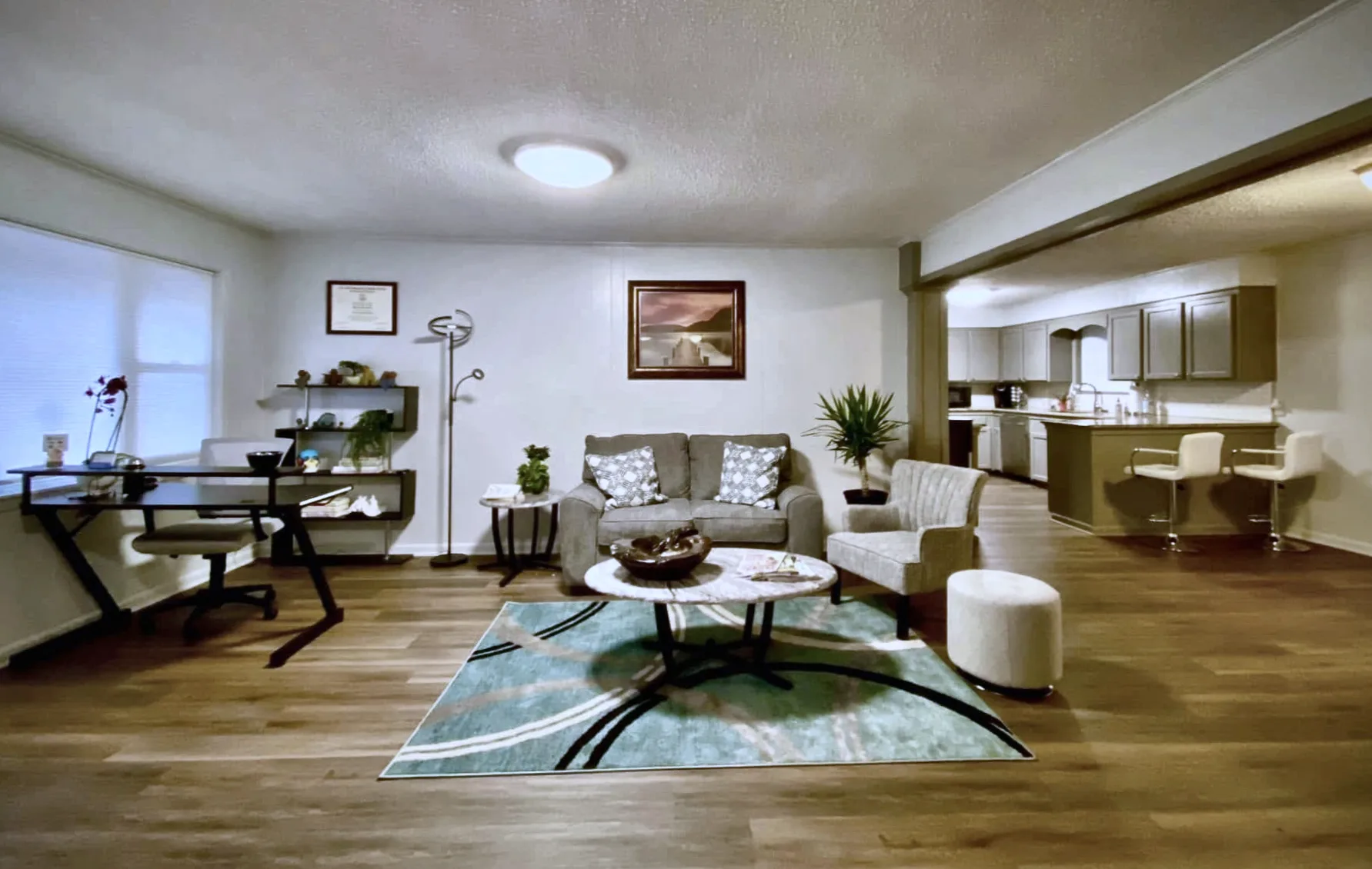 The bright, open therapy area and lounge inside Healing Hands Physical Therapy