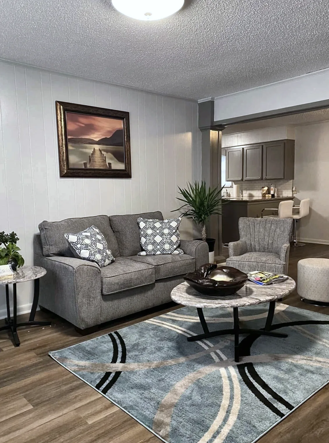 Waiting area with a sofa and armchair